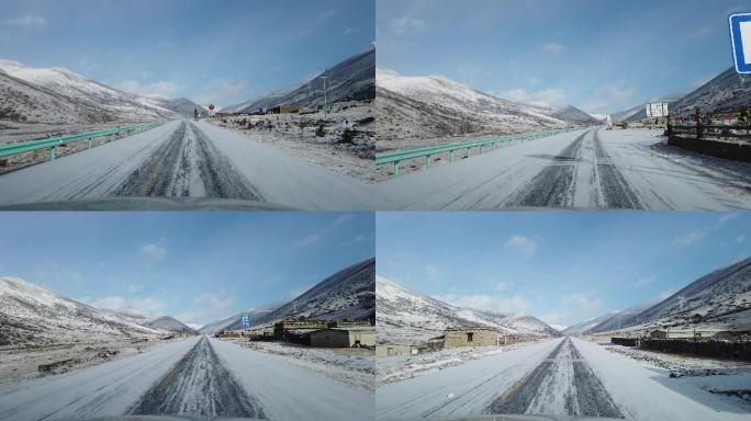 行驶在雪地西藏的路上汽车道路奔驰前进风景