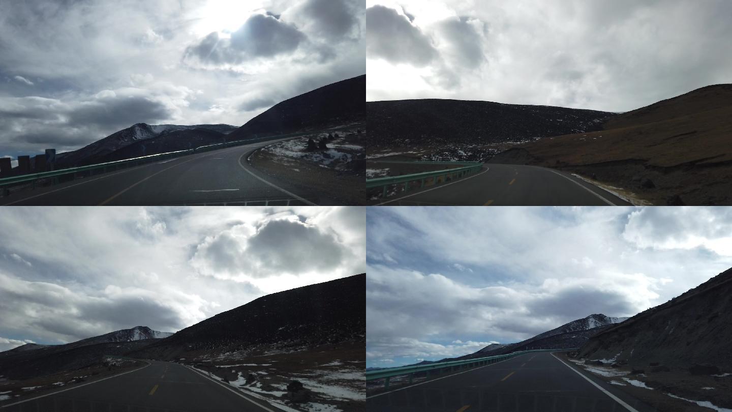 行驶在西藏的路上汽车道路奔驰前进上坡风景