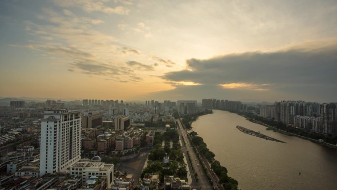 延时广东揭阳金港湾日出城市河流高楼大厦