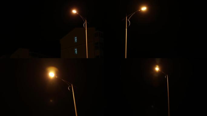城市夜晚路灯黄色的路灯小区路灯老路灯光晕