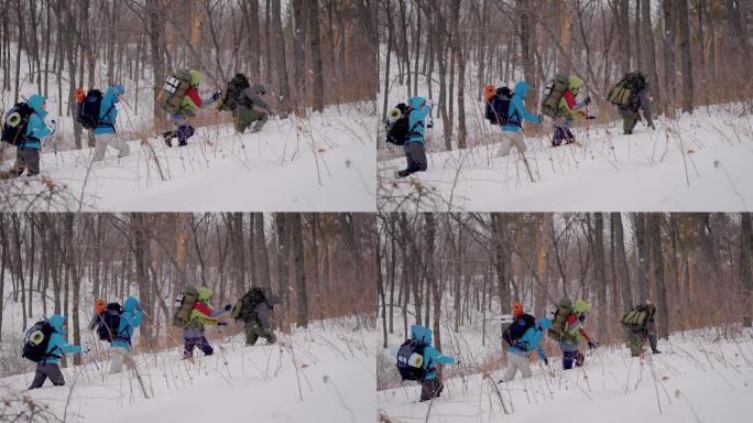 雪地行走爬雪山人群