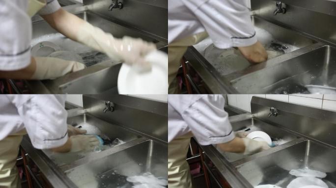 餐馆后厨洗碗间洗碗工水池手工洗碗实拍高清