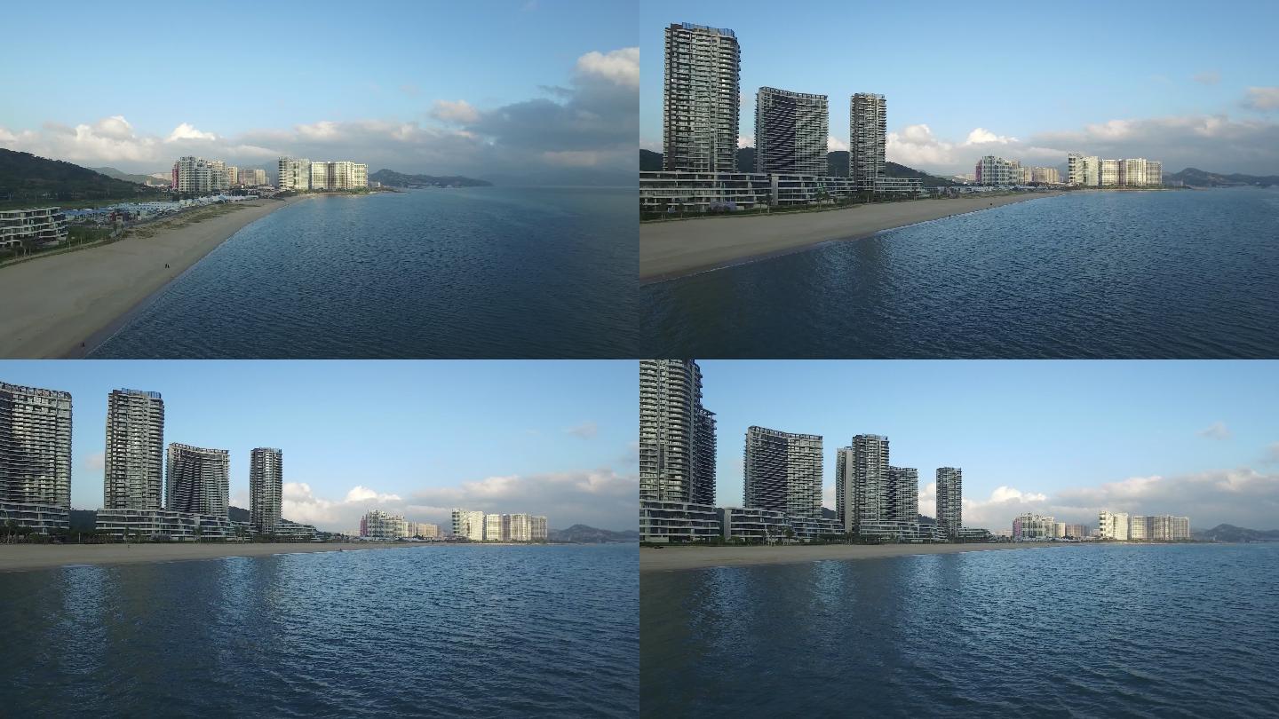 航拍海景房高楼大厦海边海水沙滩