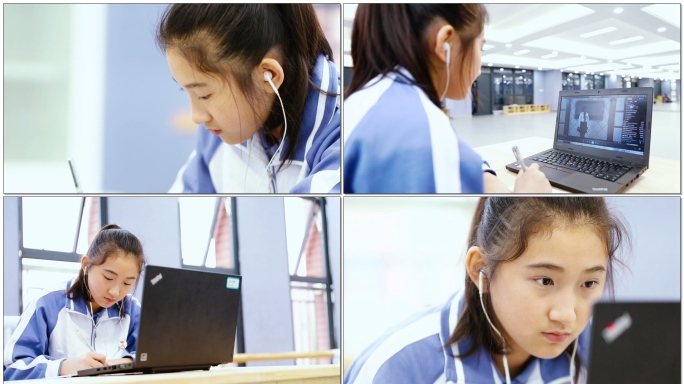 正在认真用电脑学习的女孩对镜子练习