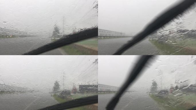 车窗外的大雨倾盆大雨雨刷汽车