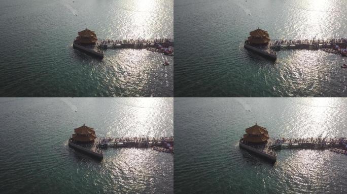 青岛海滨栈桥航拍海岸线渔船海滨旅行游客