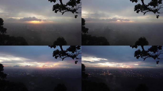 广州雨后白云山观赏烟雾与日落华灯初上美景