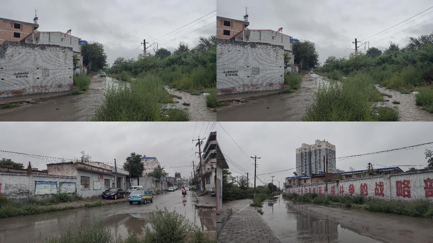 下雨农村泥泞路积水路面贫穷落后