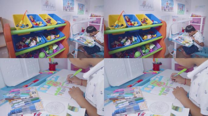 小孩儿童一个人在家中画画做作业