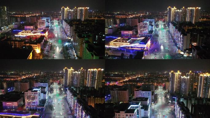 四川成都郫县城市道路夜景航拍高楼霓虹