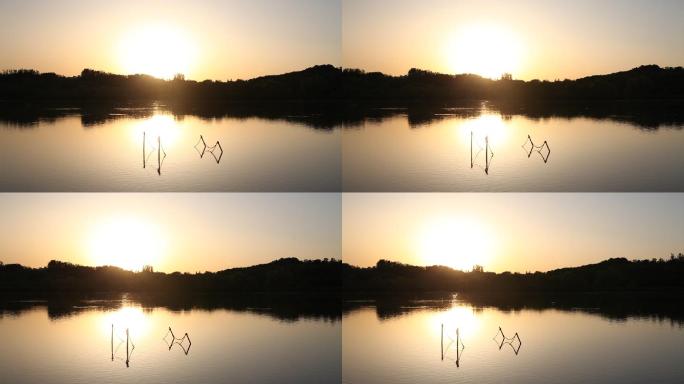 晨光照耀下静静的一潭湖水