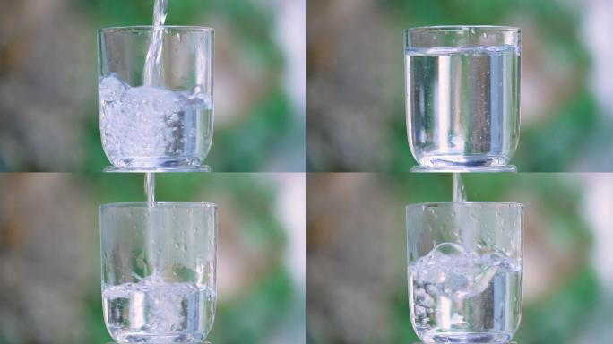 玻璃杯倒水，水流液体实拍