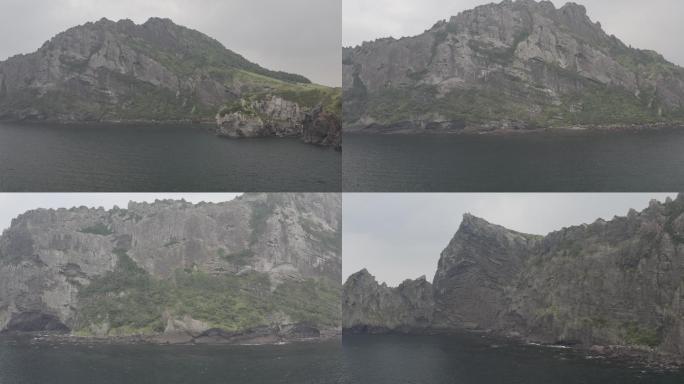 4K-log-航拍蓝色大海岸边的悬崖峭壁