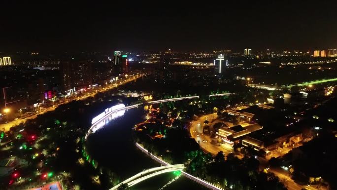 震撼大气夜景城市沿江运河高楼大厦风景航拍