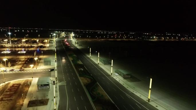 震撼大气北方夜晚城市道路路灯车辆