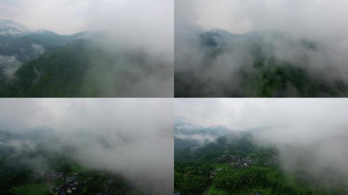 4K航拍云雾中渐显的小山村