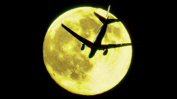 飞机飞过月球月亮