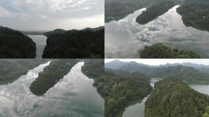 水面云的倒影及群山绿水4K航拍