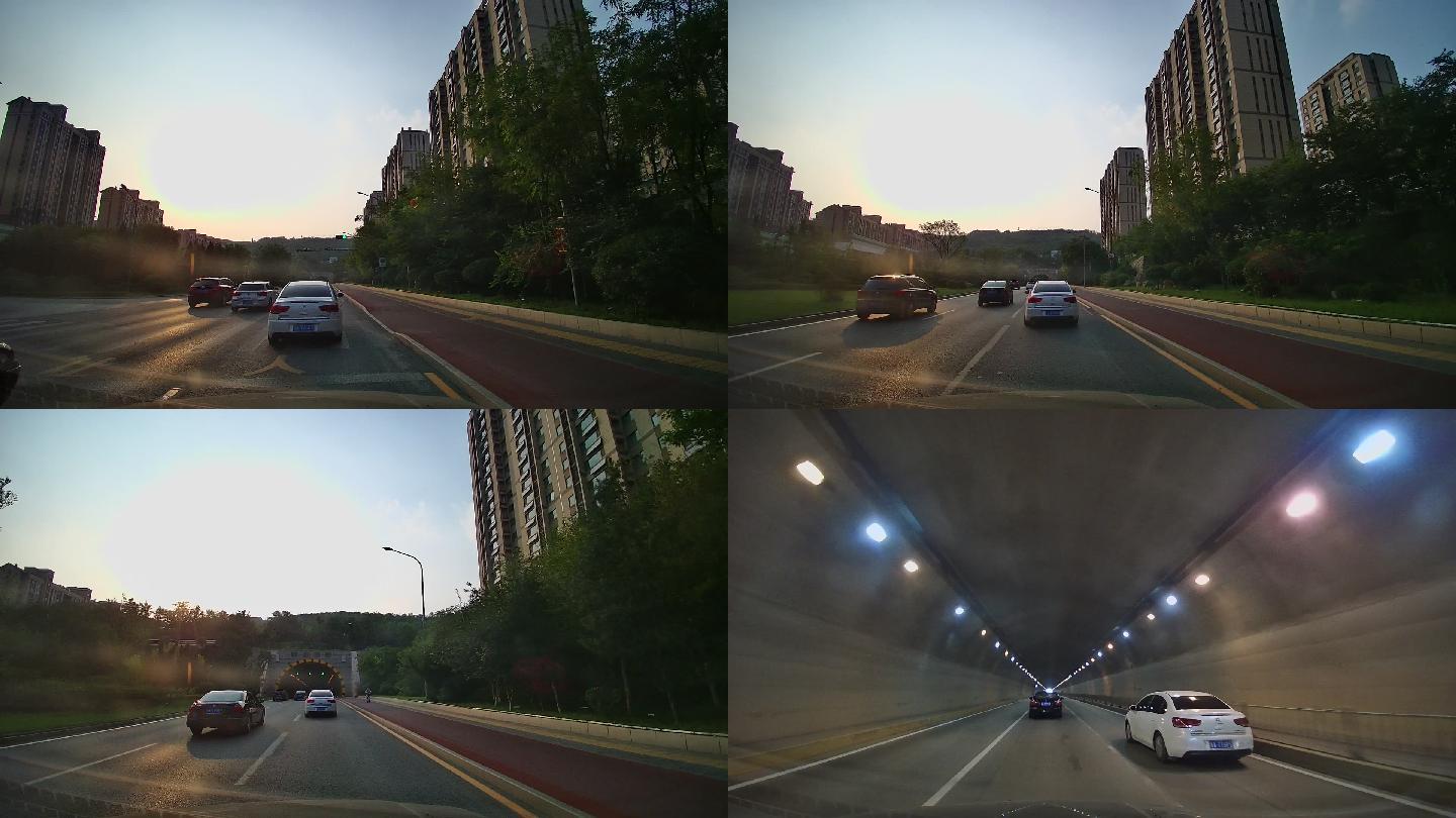 城市道路车内拍摄行驶的车辆隧道阳光逆光