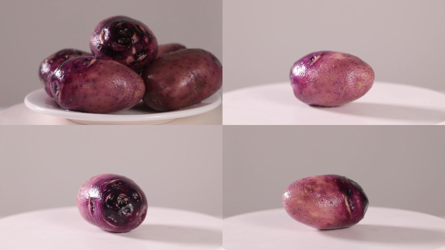 洗干净的紫土豆乌洋芋高清旋转特写