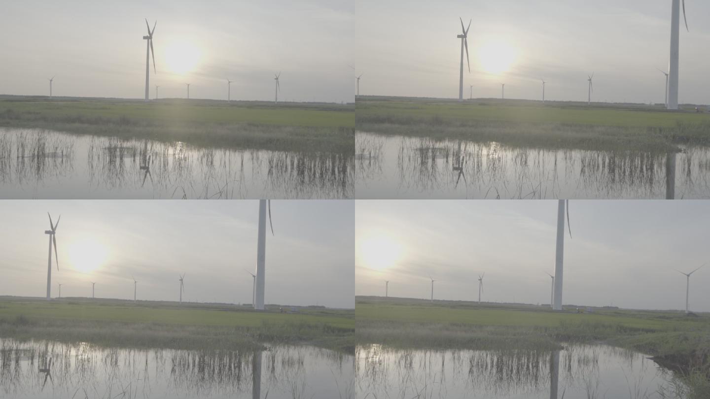 风力发电风车稻田夕阳空境河边