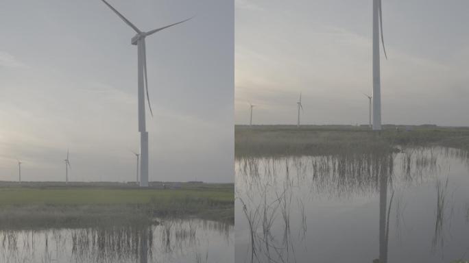 风车风力发电河边水边稻田田地