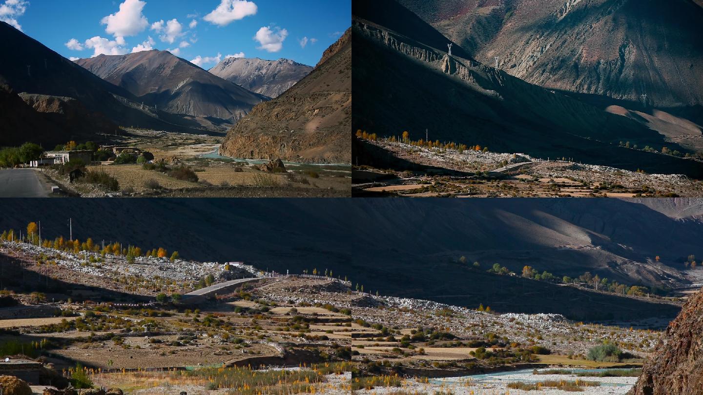金秋季节西藏高原的大山和村庄