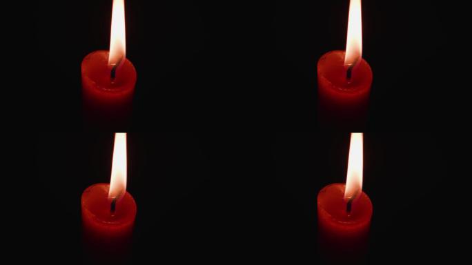 4K燃烧的红蜡烛视频素材
