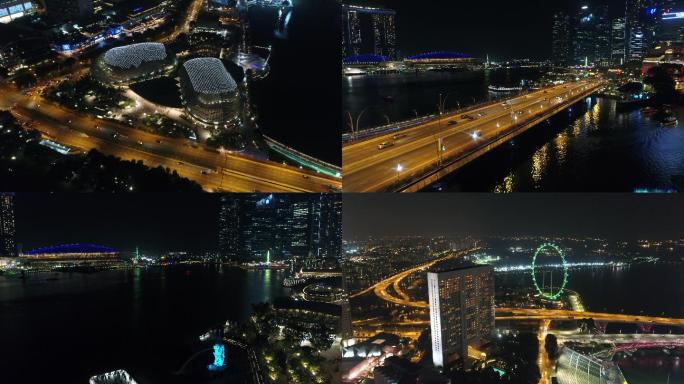 4k航拍新加坡城市夜景鱼尾狮广场金沙酒店