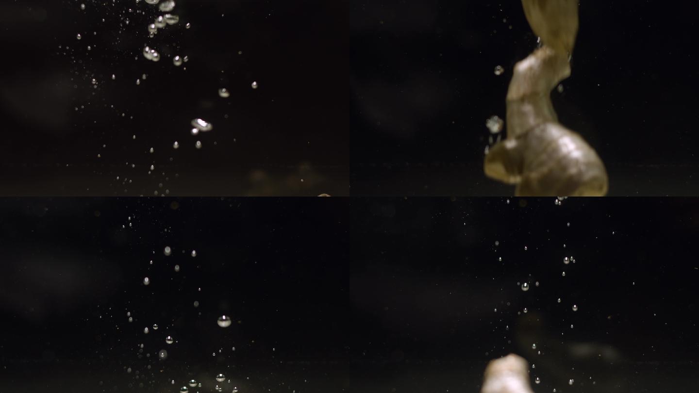 生姜掉入水中慢镜头