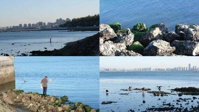 渔民赶海淘海鲜海边生活海岸礁石