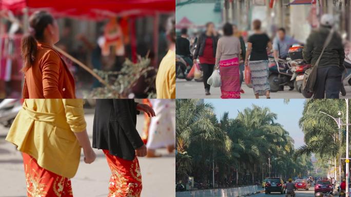 中缅边境街上走着的傣族妇女特色服饰-