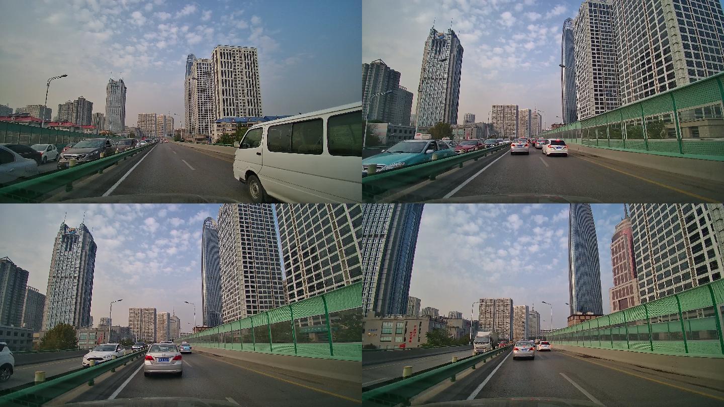 城市公路车辆行驶车内拍摄立交桥高楼