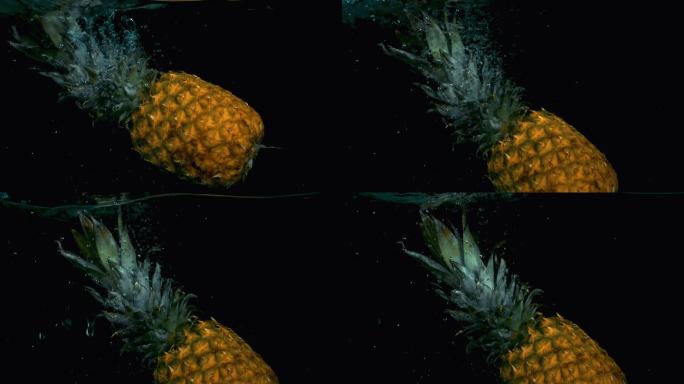 实拍慢动作升格近景菠萝落入水中