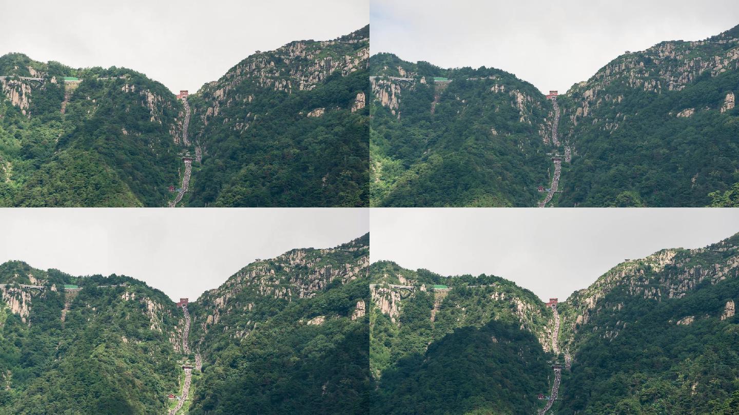 泰安东岳泰山十八盘全景蓝天白云绿树景点