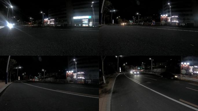 马路上的车辆近光灯远光灯夜间行驶