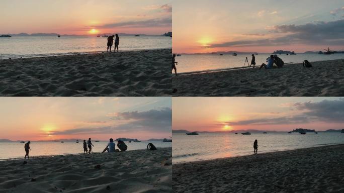 海边吹风夕阳情侣捡贝壳沙滩海