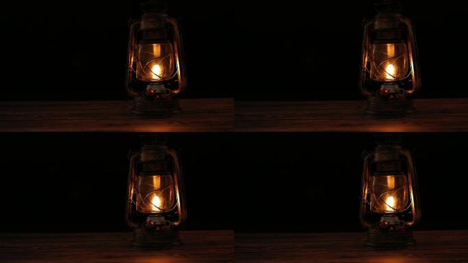 木桌上的煤油灯