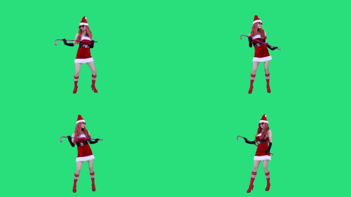 红发圣诞节美女在跳拐杖舞