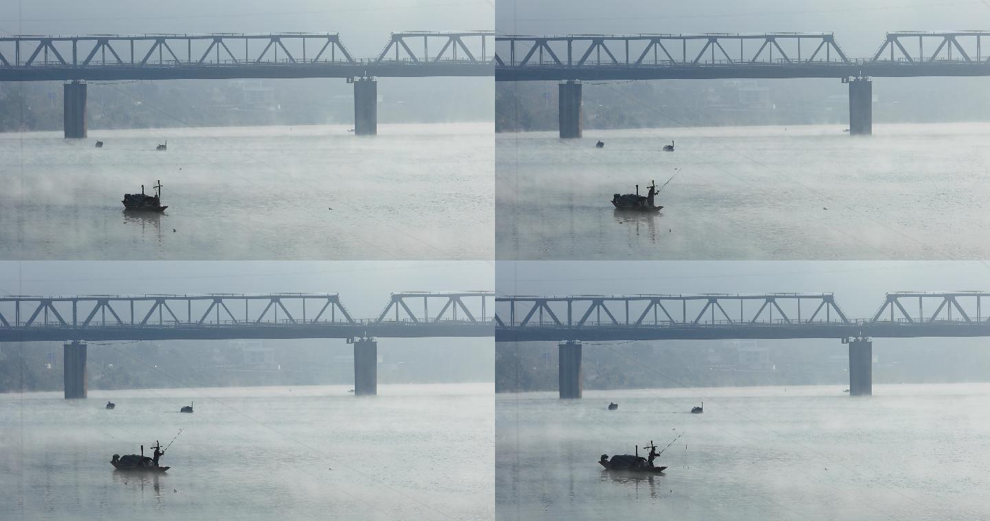 河面晨雾渔船渔翁钓鱼