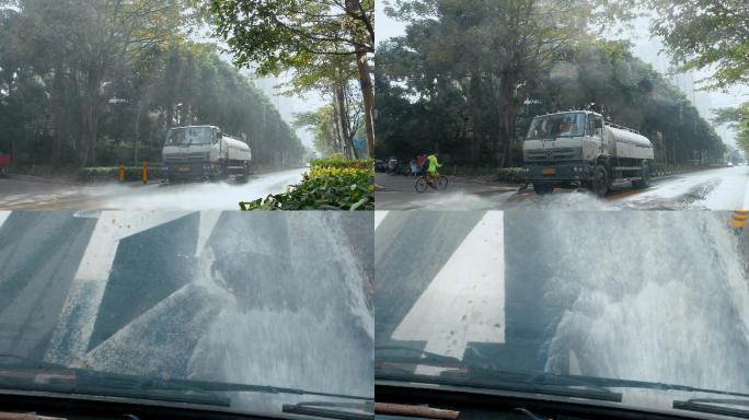 洒水车视频深圳市街头洒水车喷水清洗慢镜头