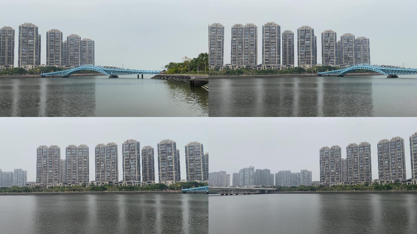 4K钢构桥和河岸对面的住宅区