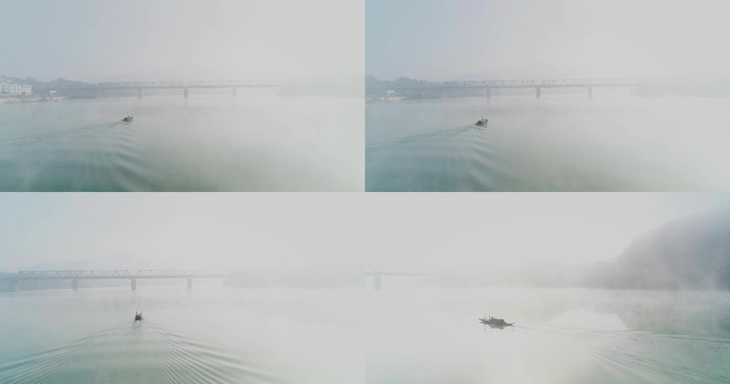 晨雾中的河面渔船驶过04