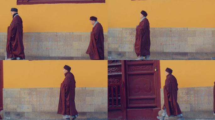 僧侣走过寺庙院墙