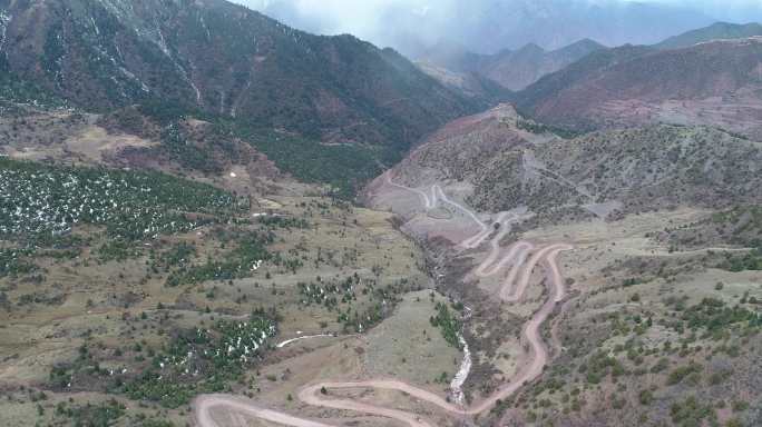 航拍西藏公路施工盘山公路