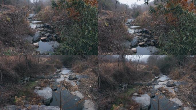 4k视频，冬季山林里干涸的小溪