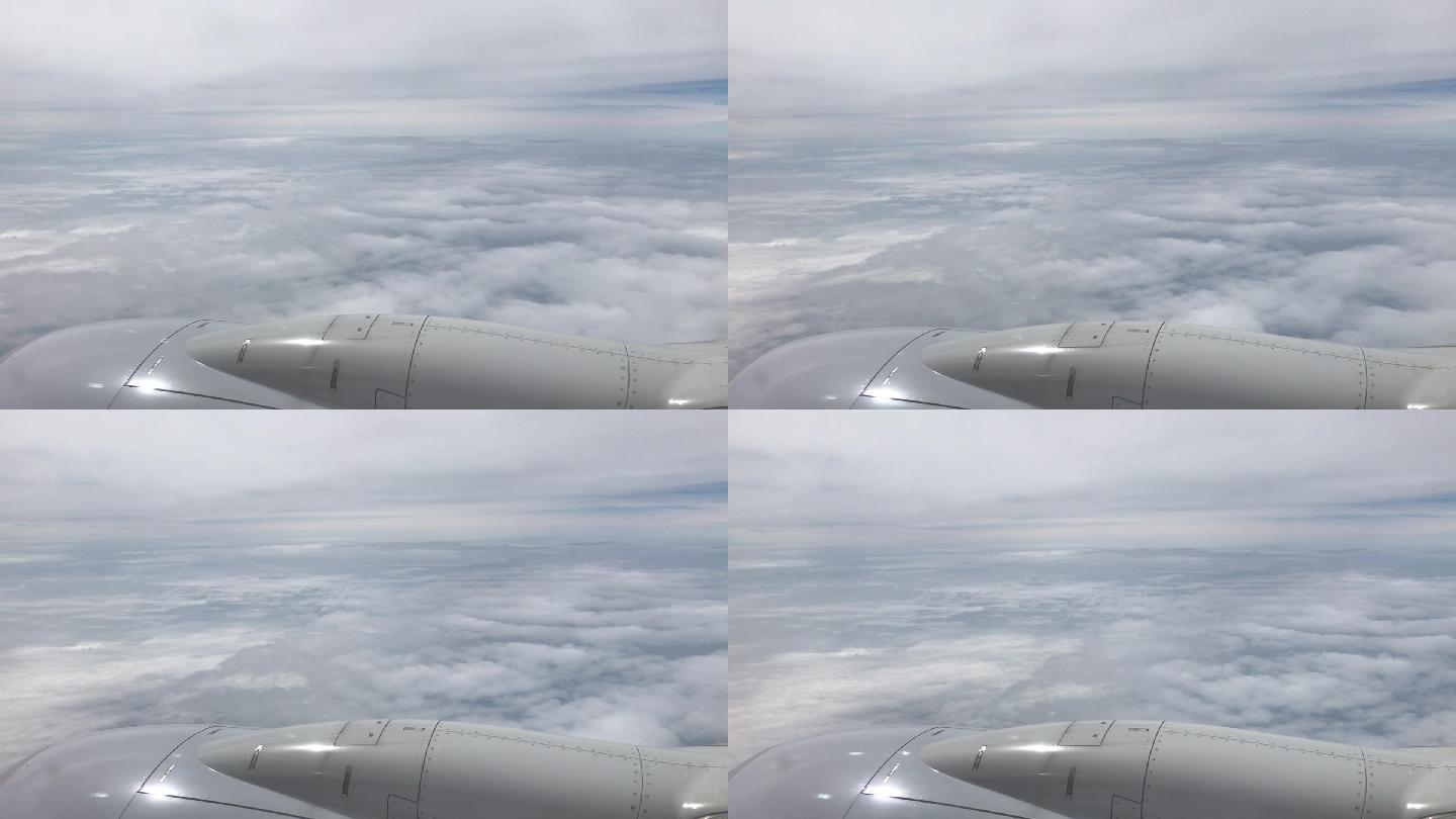 飞机飞行穿梭云间美丽云朵高空俯瞰