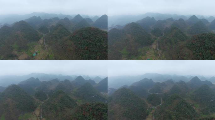 4k航拍，雾气中馒头一般的丘陵延绵远山