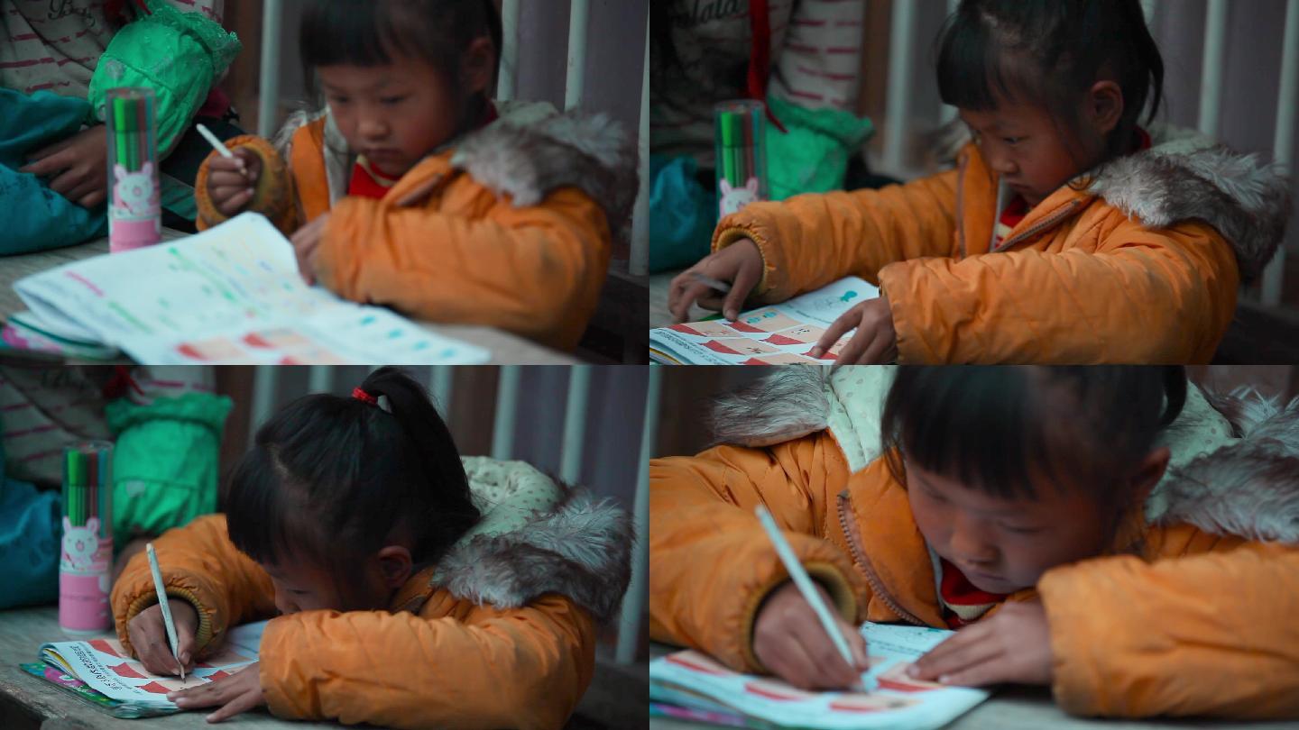 冬季，农村里在户外写作业的小女孩