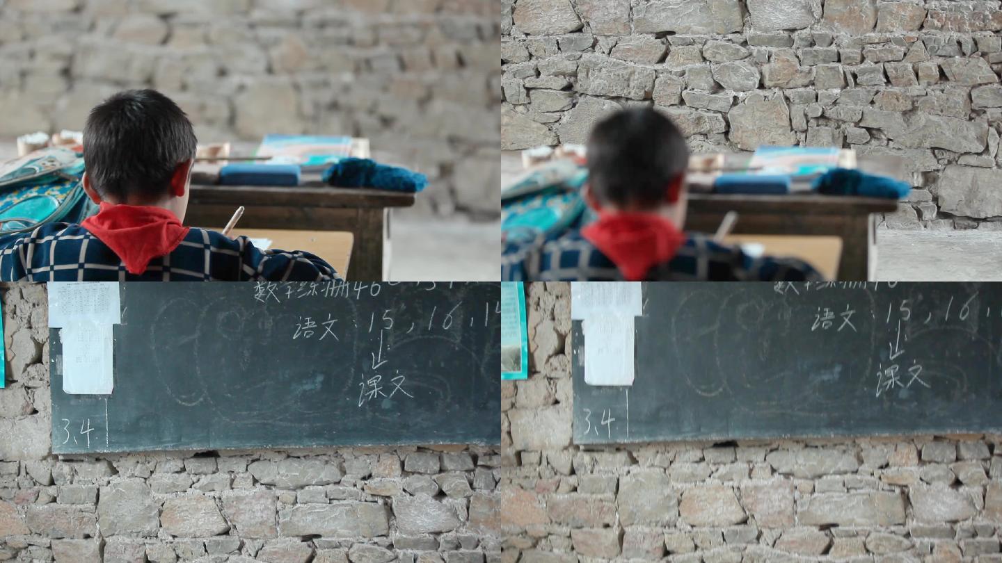 贫困小学生云南山区学生在石头教室里写字